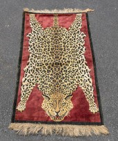WOVEN LEOPARD MOTIF THROW RUG