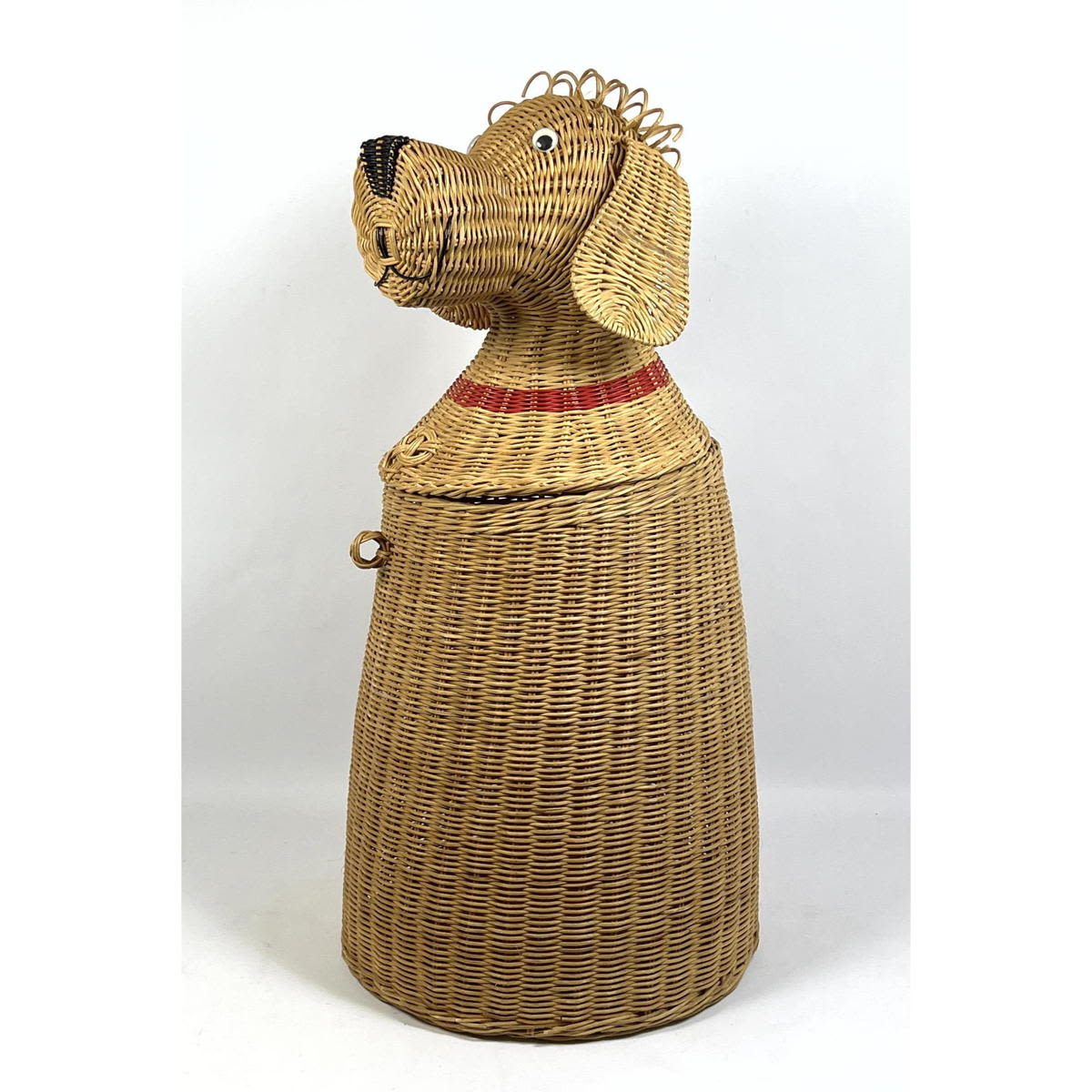 Woven wicker figural dog hamper.