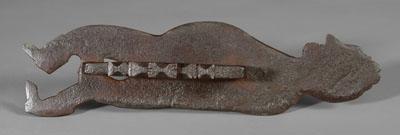 Wrought iron door pull, man wearing
