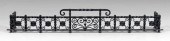 Wrought iron fender, cast and