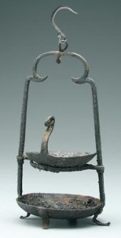Wrought iron footed grease lam