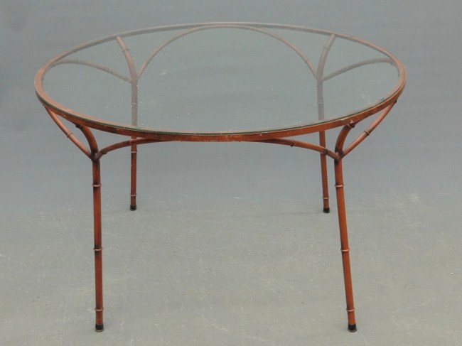 Wrought iron glass top table. Top
