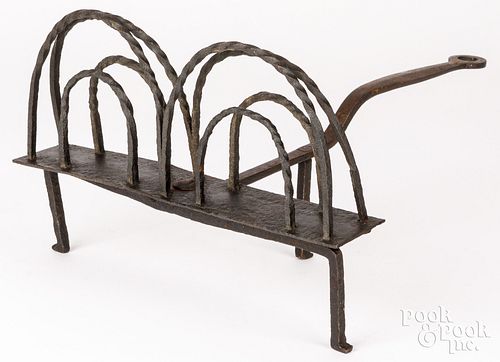 WROUGHT IRON REVOLVING TOASTER,