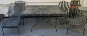 WROUGHT IRON TABLE AND TWO PAI