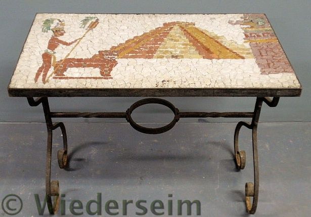 Wrought iron table with an Egyptian