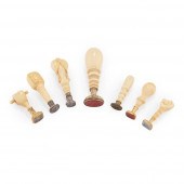 Y A GROUP OF SEVEN IVORY HANDL