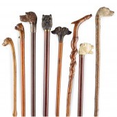 Y GROUP OF EIGHT DOG HEAD WALK