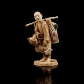 Y IVORY OKIMONO FIGURE OF A ST