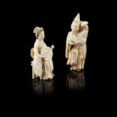 Y TWO CARVED IVORY OKIMONOS
ME