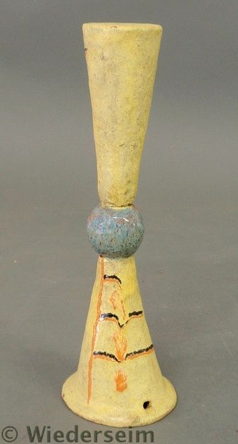 Yellow glazed earthenware object