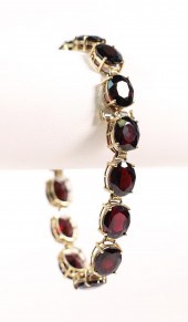 YELLOW GOLD 60CTW GARNET BRACE