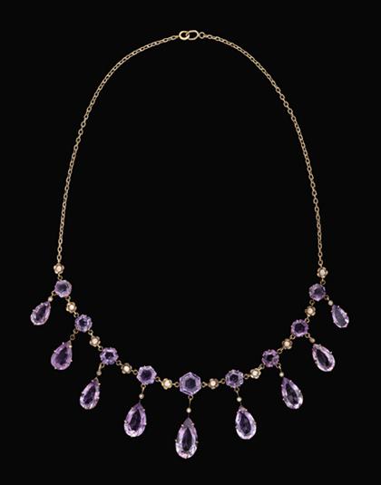 Yellow gold and amethyst stylized