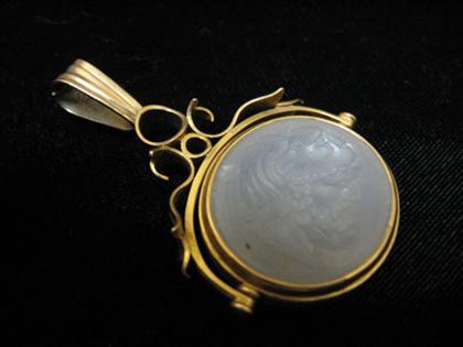 Yellow gold and intaglio carved