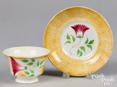 YELLOW SPATTER CUP AND SAUCER
