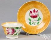 YELLOW SPATTER CUP AND SAUCER