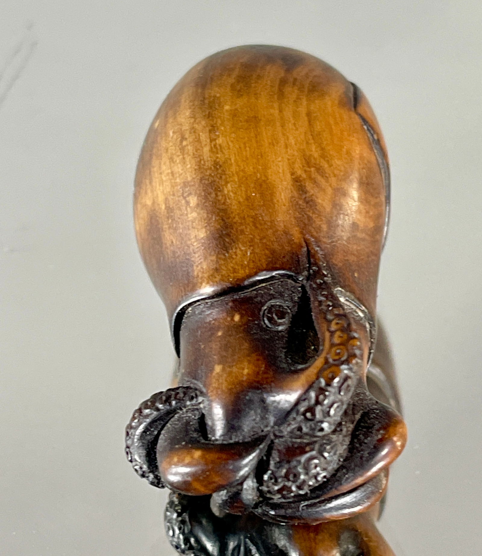 YOSUI: A RARE WOOD NETSUKE OF A