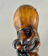 YOSUI: A RARE WOOD NETSUKE OF