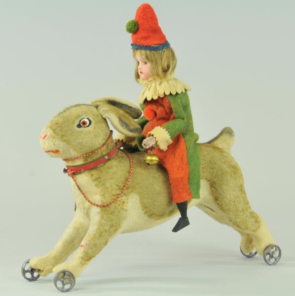 YOUNG BISQUE HEAD GIRL RIDING