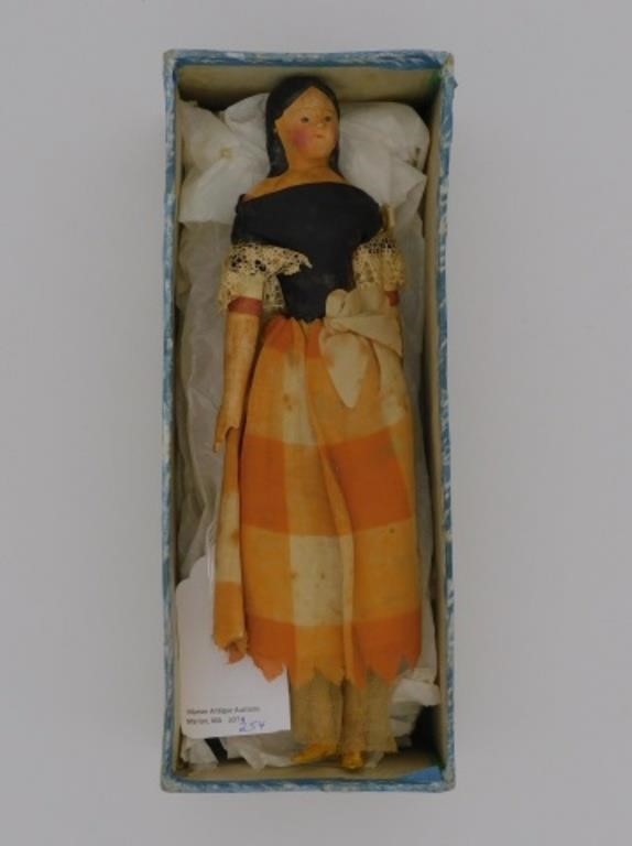YOUNG GIRL DOLL WITH A CARVED AND